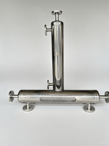 Спиральный/навитой трубчатый теплообменник из полированной нержавеющей стали для пищевой промышленности. Длительный срок службы. Экологичность. Низкие затраты на техническое обслуживание.